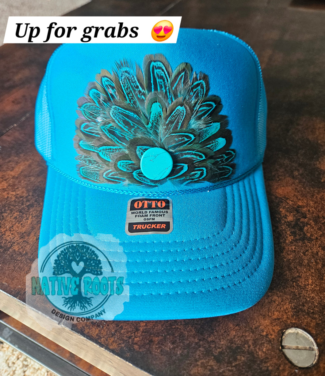 Turquoise feather hat